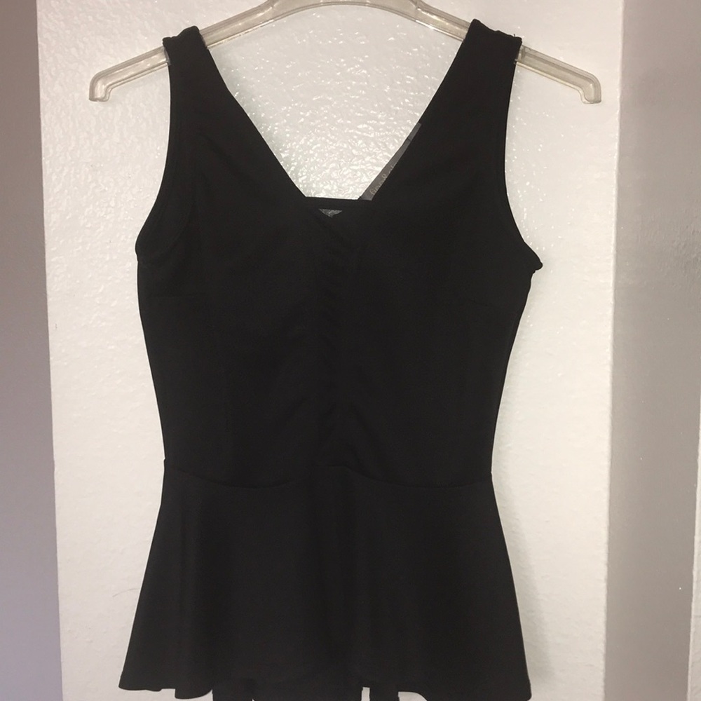 Black see through dress shirt .